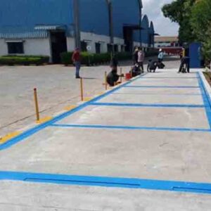 Workers at installation of the Pit Weighbridge for truck use.